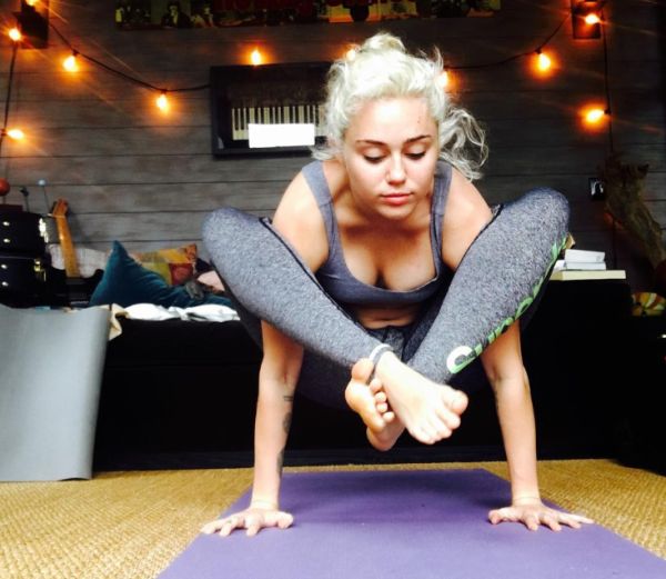 celebrity workout miley cyrus yoga pose